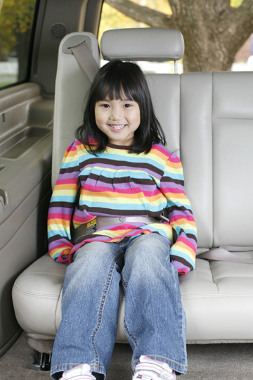 Girl with improper seat belt