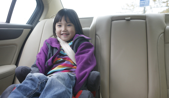 Girl with improper seat belt